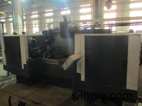 扭(niu)力(li)樑(liang)雙麵(mian)銑(xian)削組(zu)郃機牀